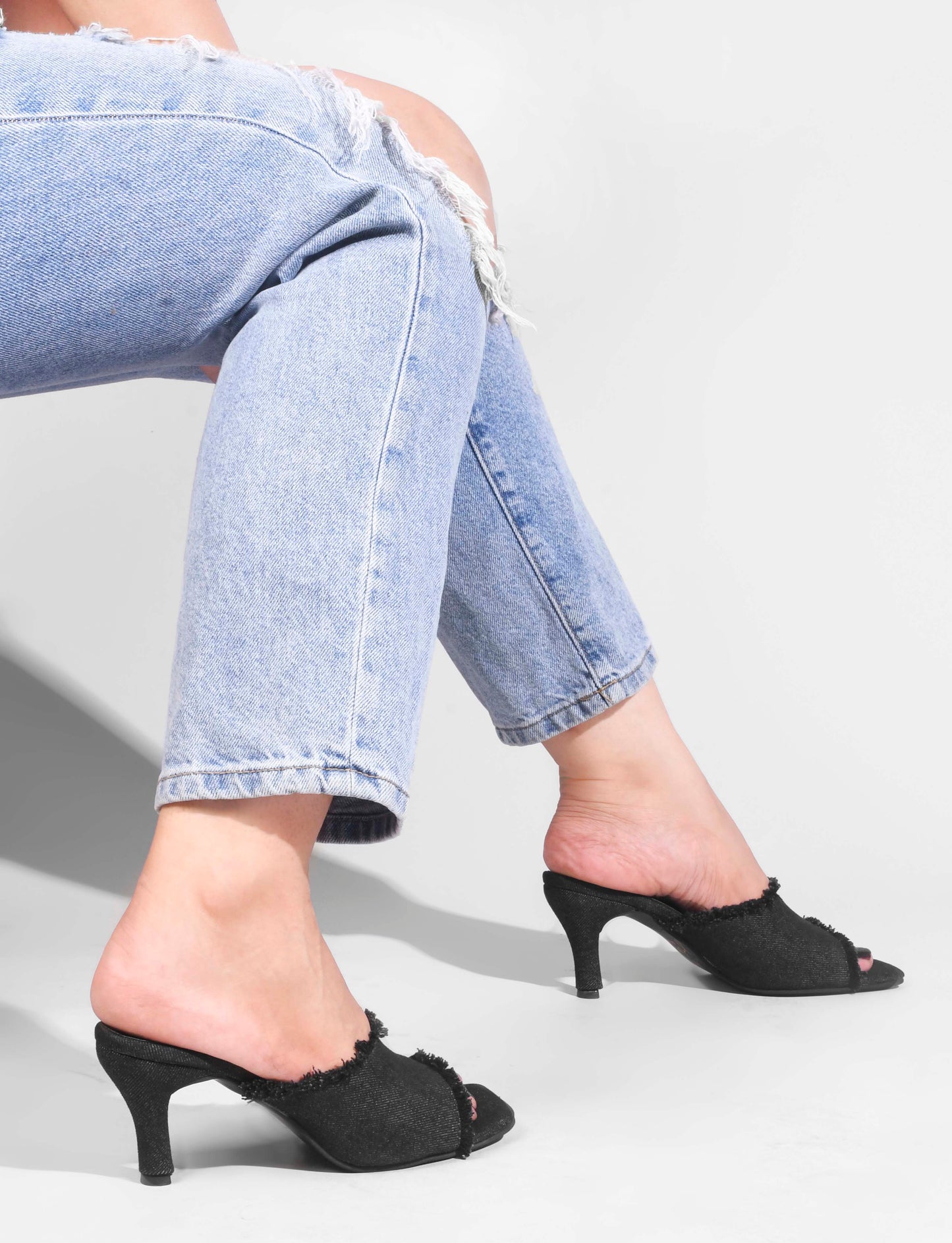 Jm Looks women's frayed edge kitten heel mules with an open toe
Black
