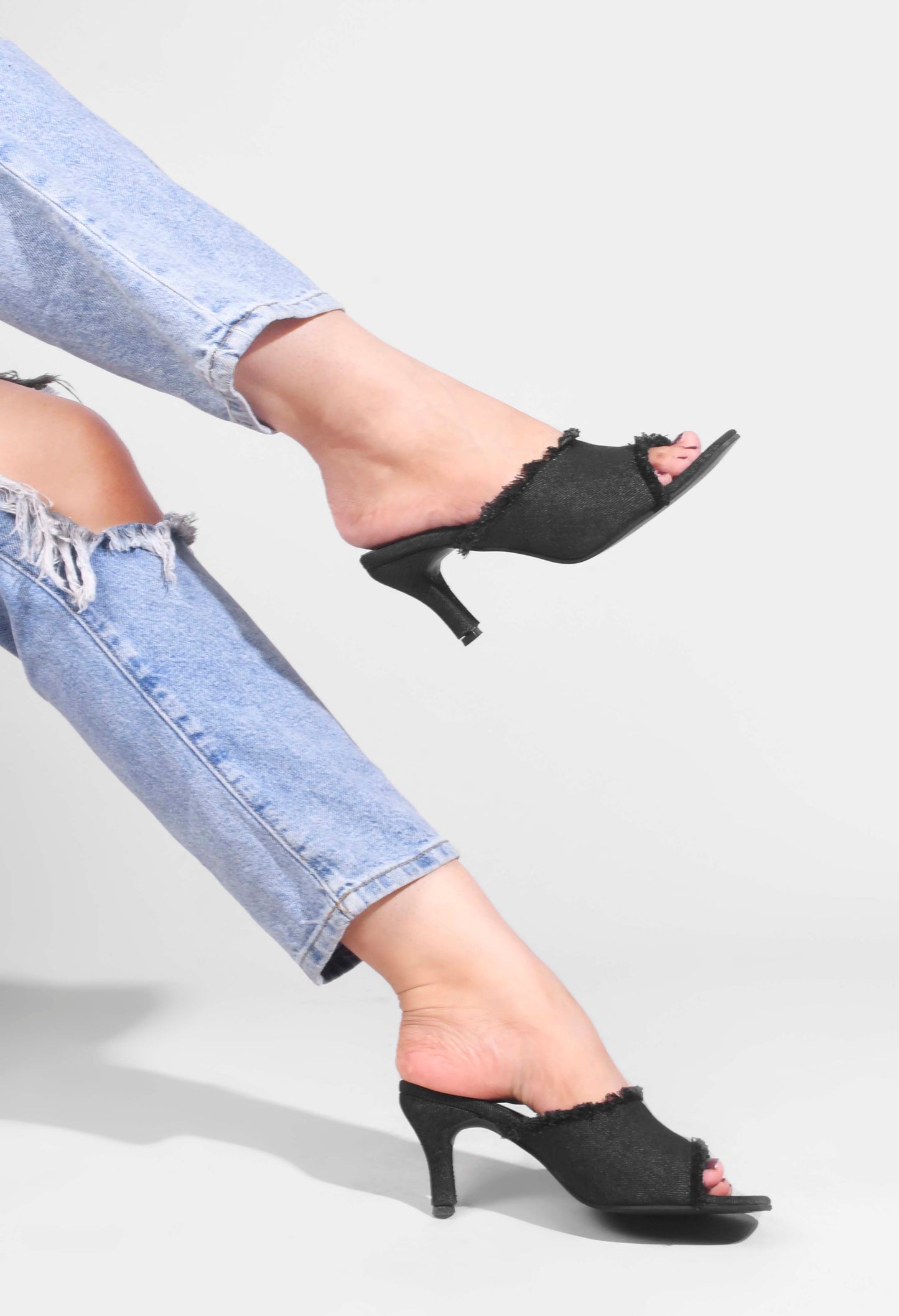 Jm Looks women's frayed edge kitten heel mules with an open toe
Black
