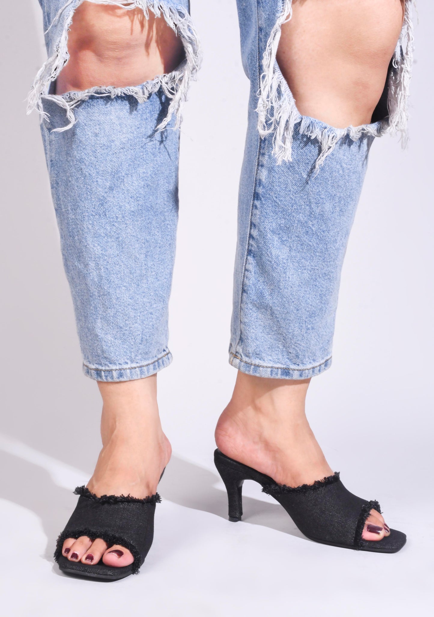 Jm Looks women's frayed edge kitten heel mules with an open toe
Black