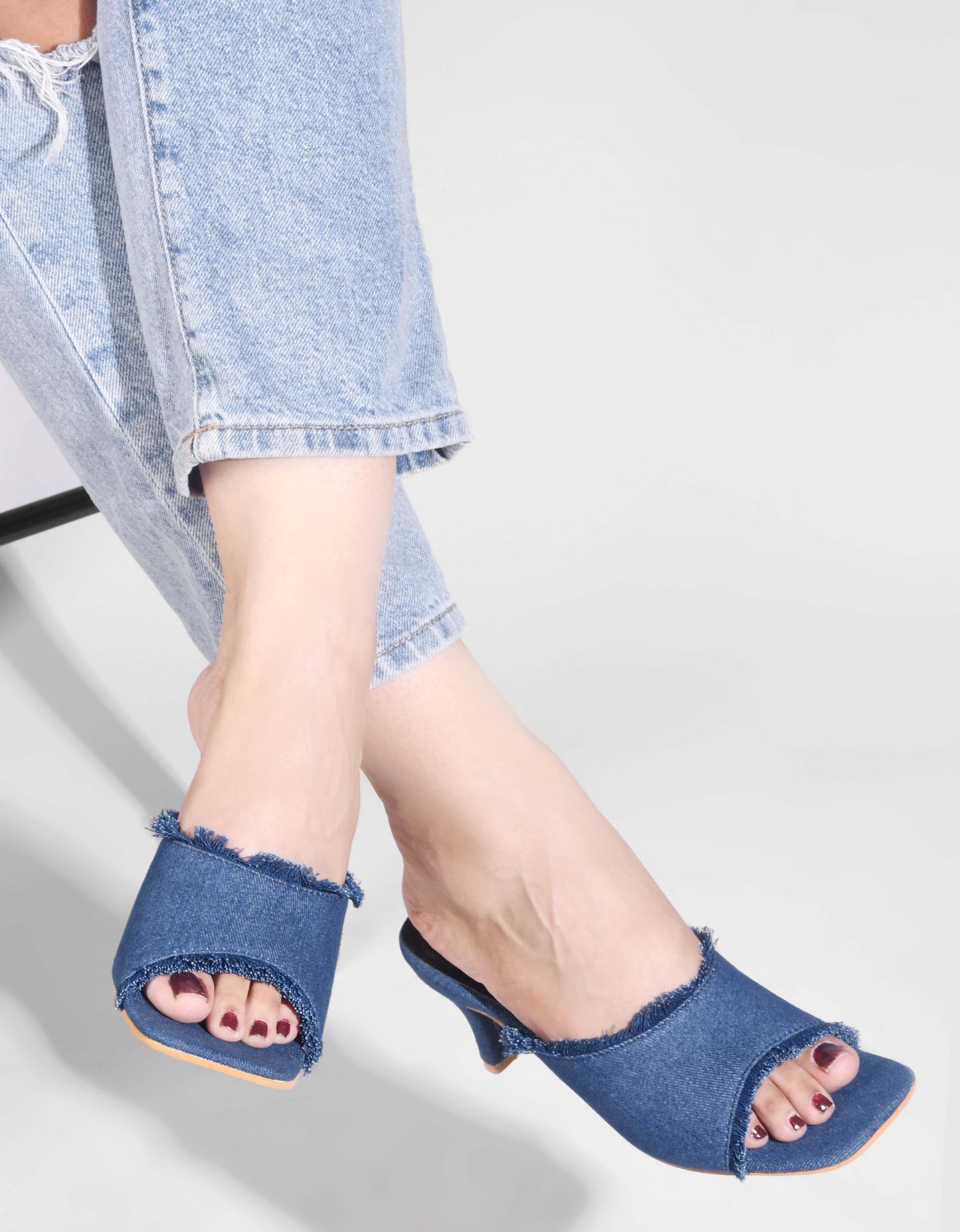 Jm Looks women's frayed edge kitten heel mules with an open toe
Blue