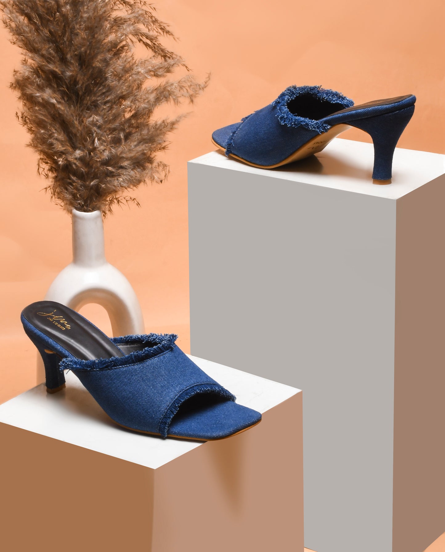 Jm Looks women's frayed edge kitten heel mules with an open toe
Blue