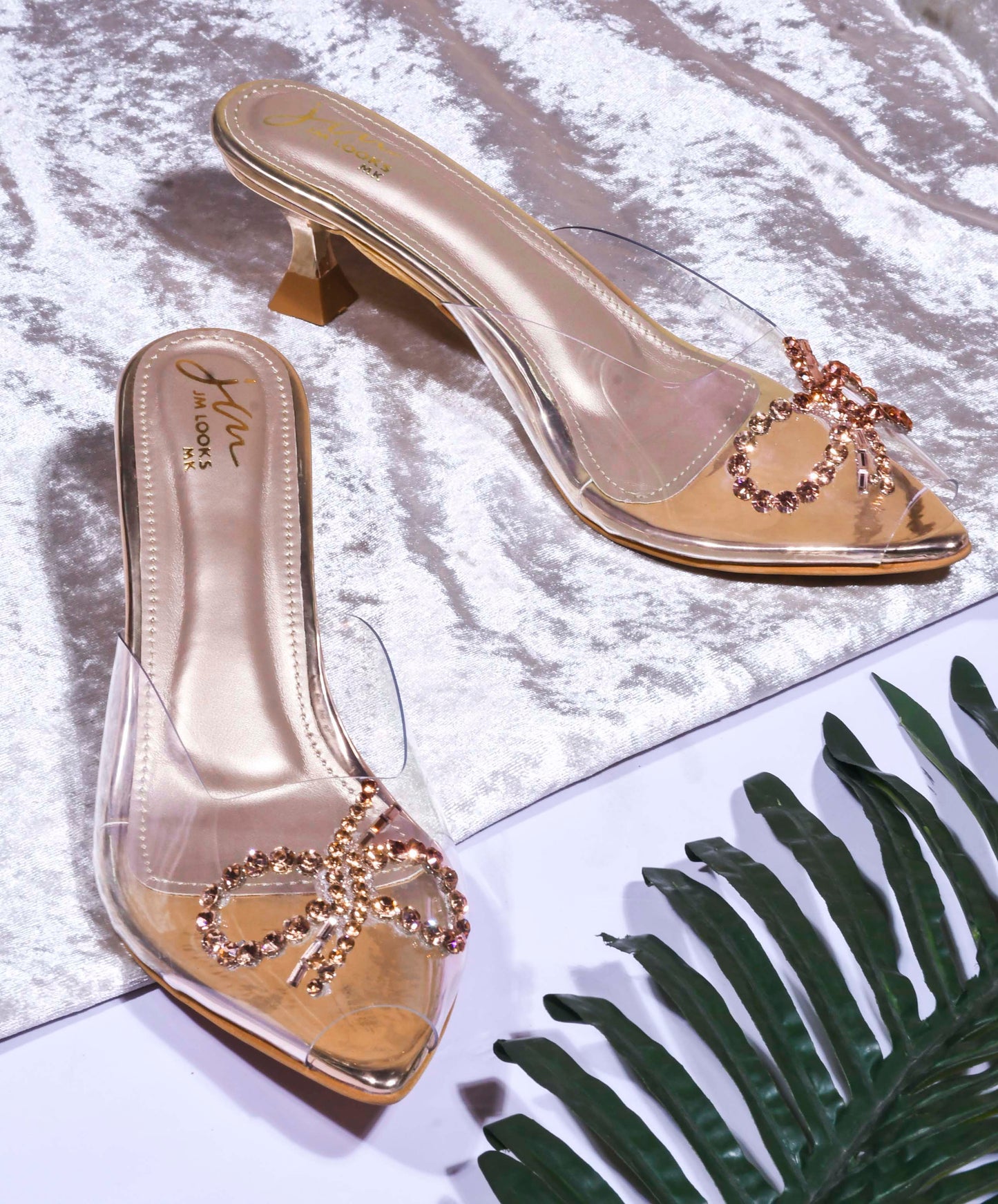 Jm Looks women's embellished clear strap heels with a decorative design
Sultan