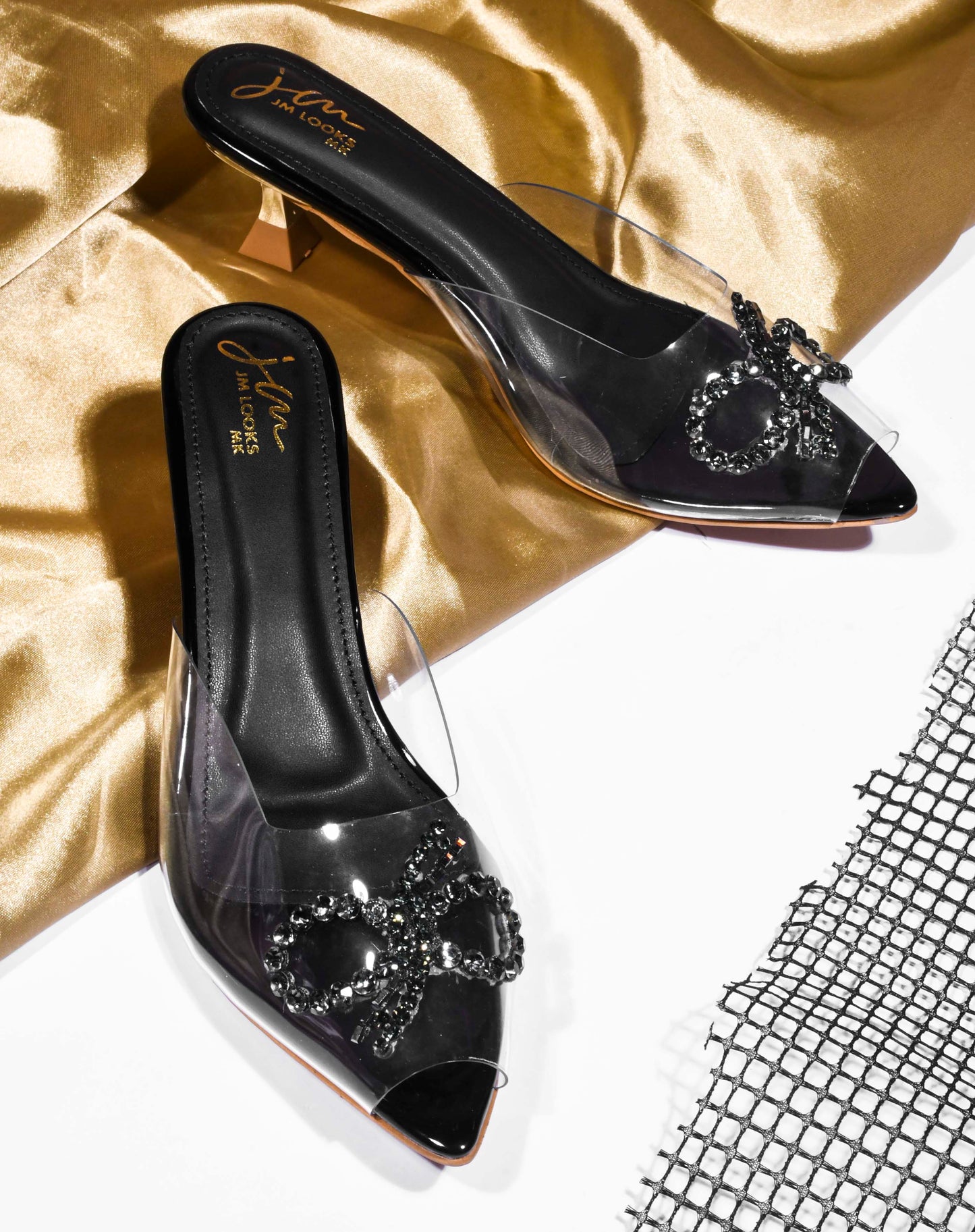 Jm Looks women's embellished clear strap heels with a decorative design
Black