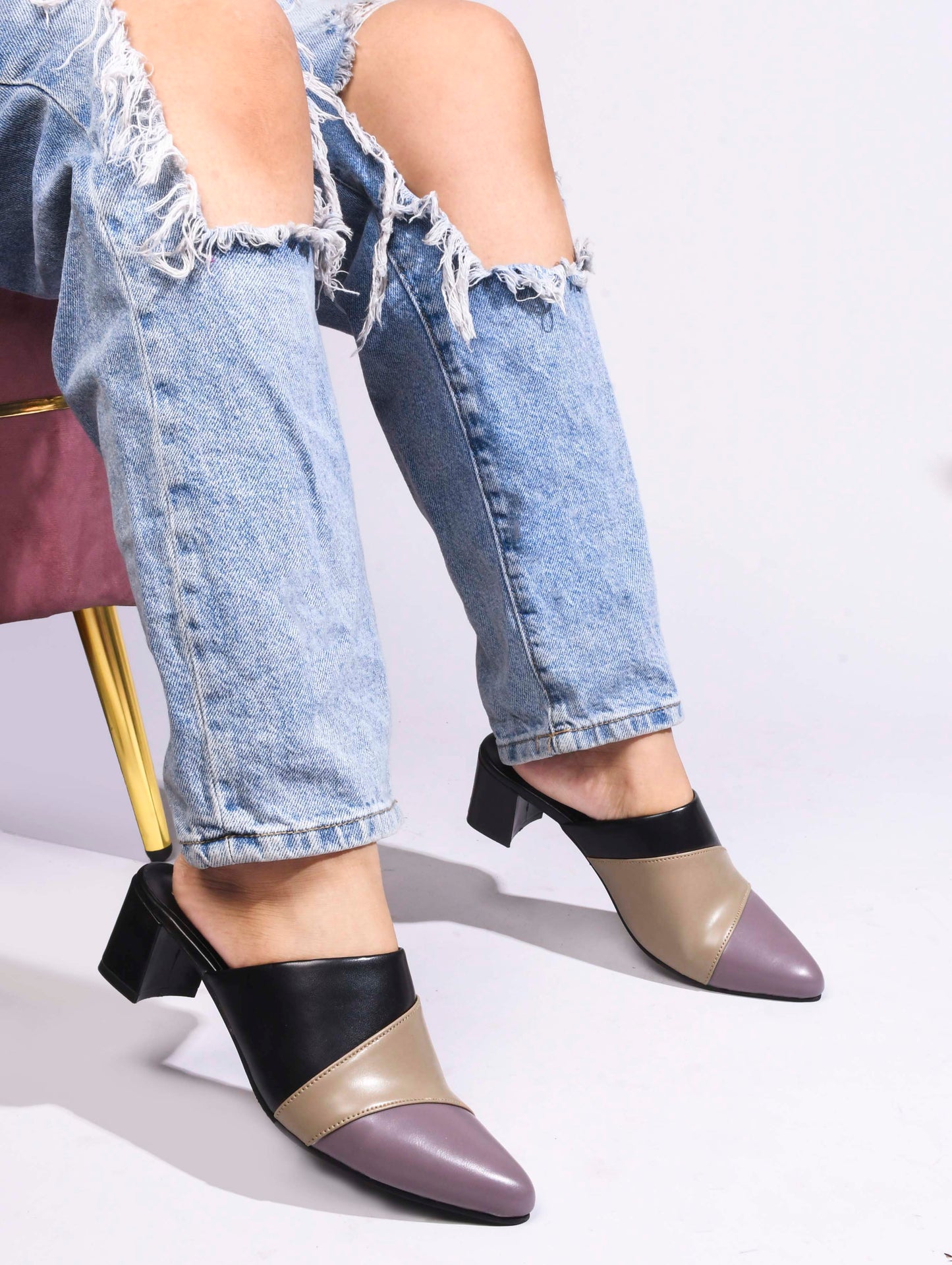 Jm Looks women's pointed toe block heel mules with a unique design
Black