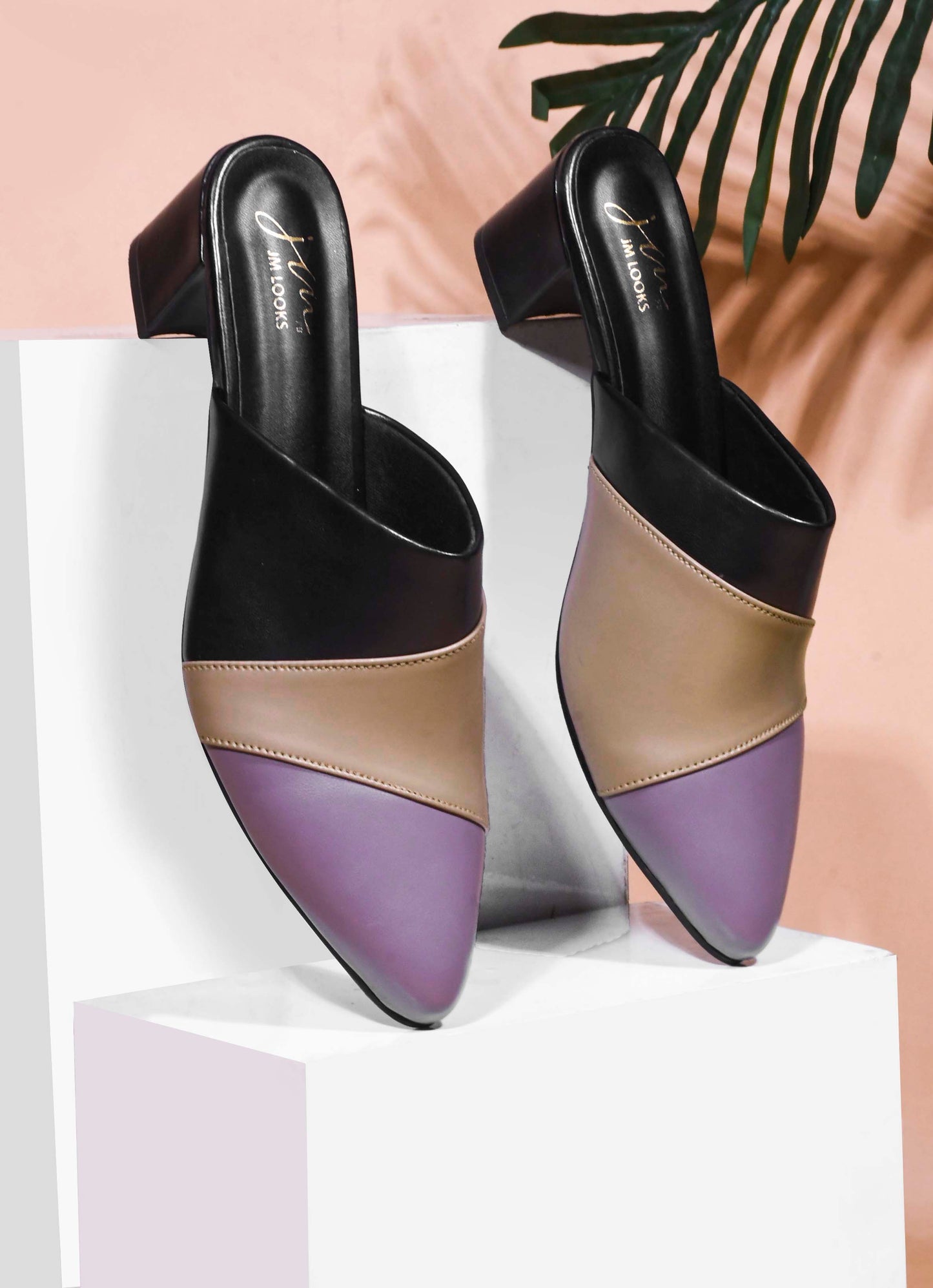 Jm Looks women's pointed toe block heel mules with a unique design
Black