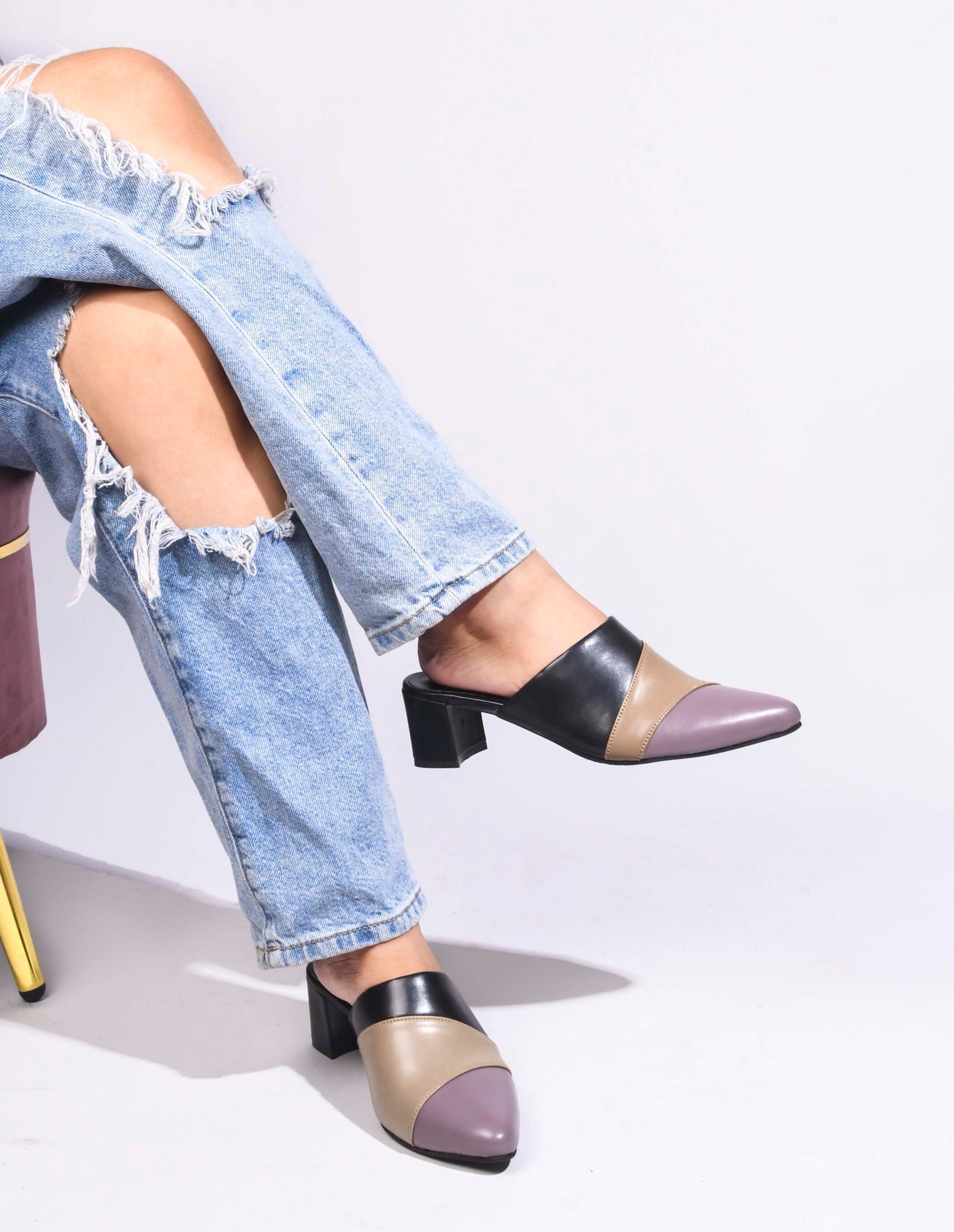 Jm Looks women's pointed toe block heel mules with a unique design
Black