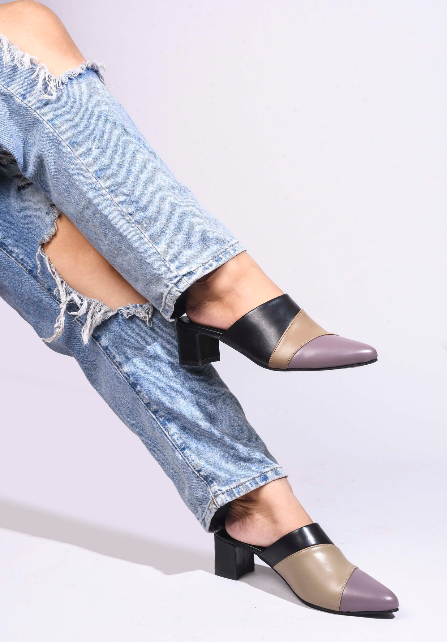 Jm Looks women's pointed toe block heel mules with a unique design
Black