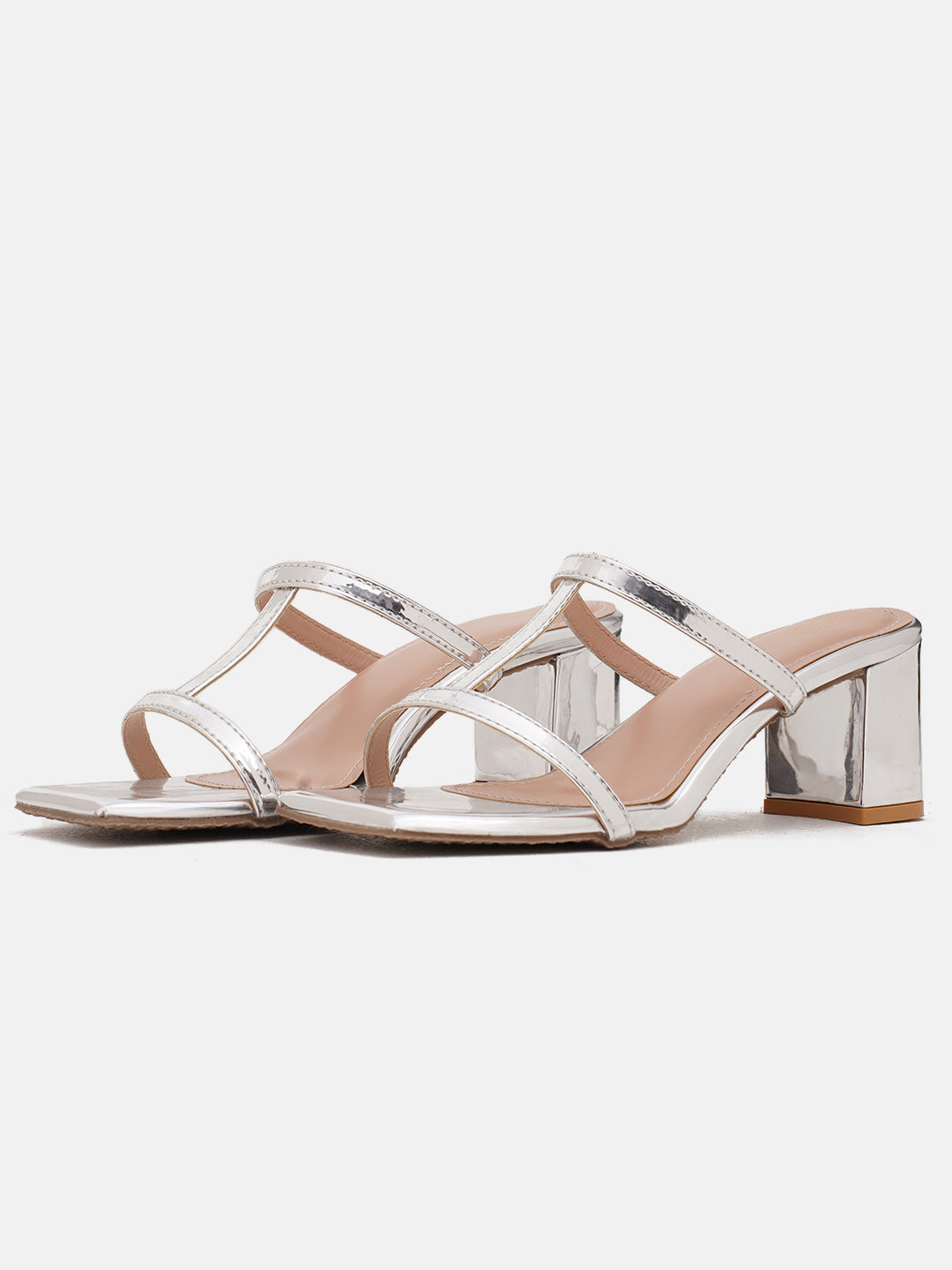 strappy block heel mules with a square toe design
Silver