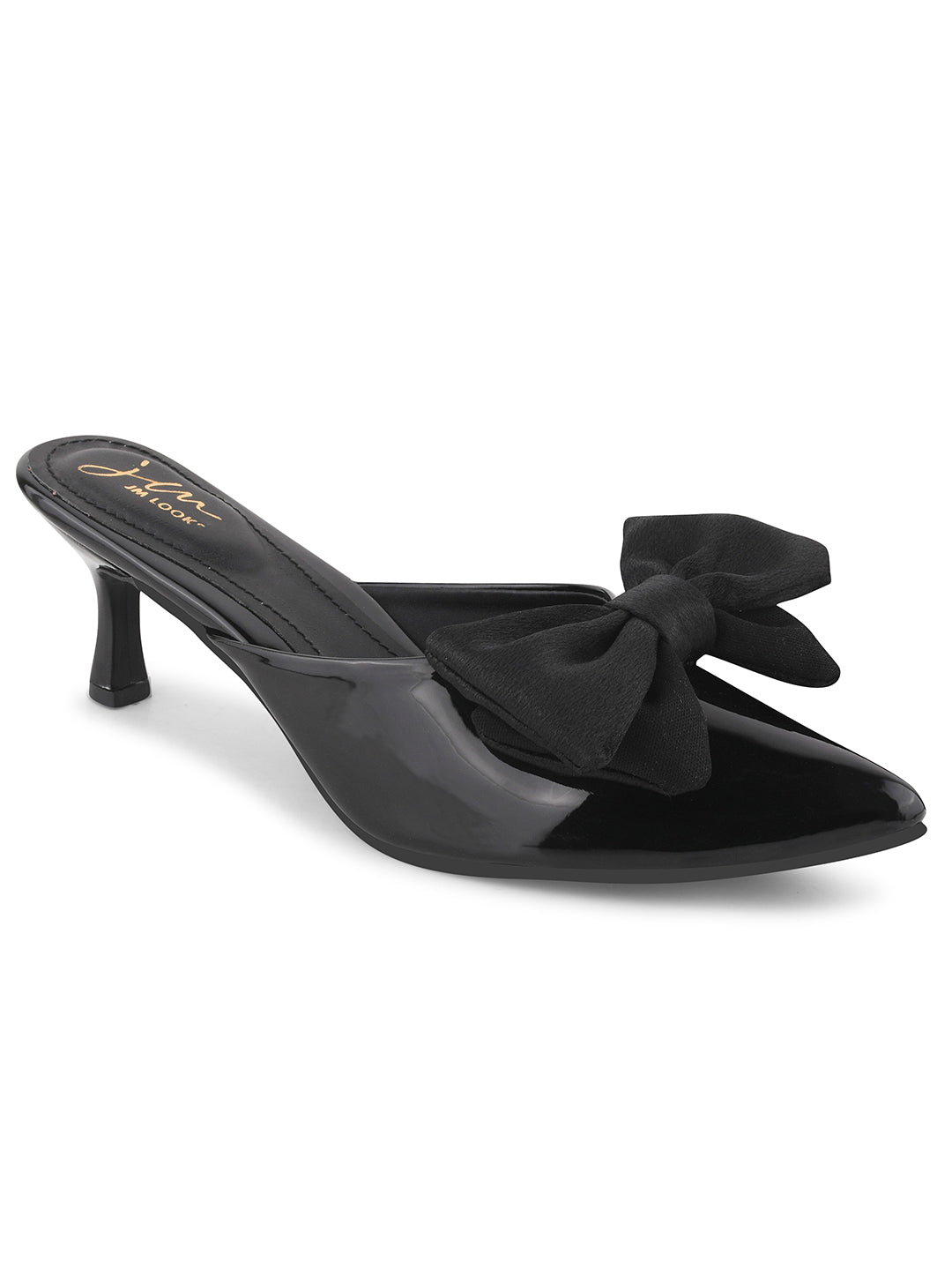 pointed toe heels featuring a large bow detail on the front
Black