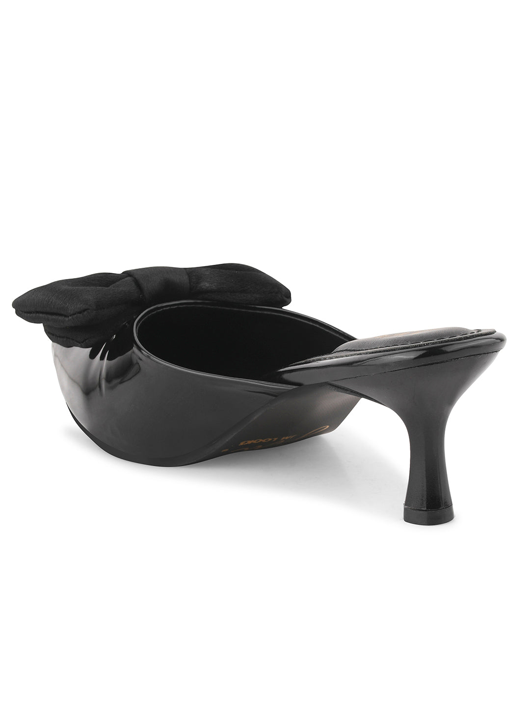 pointed toe heels featuring a large bow detail on the front
Black