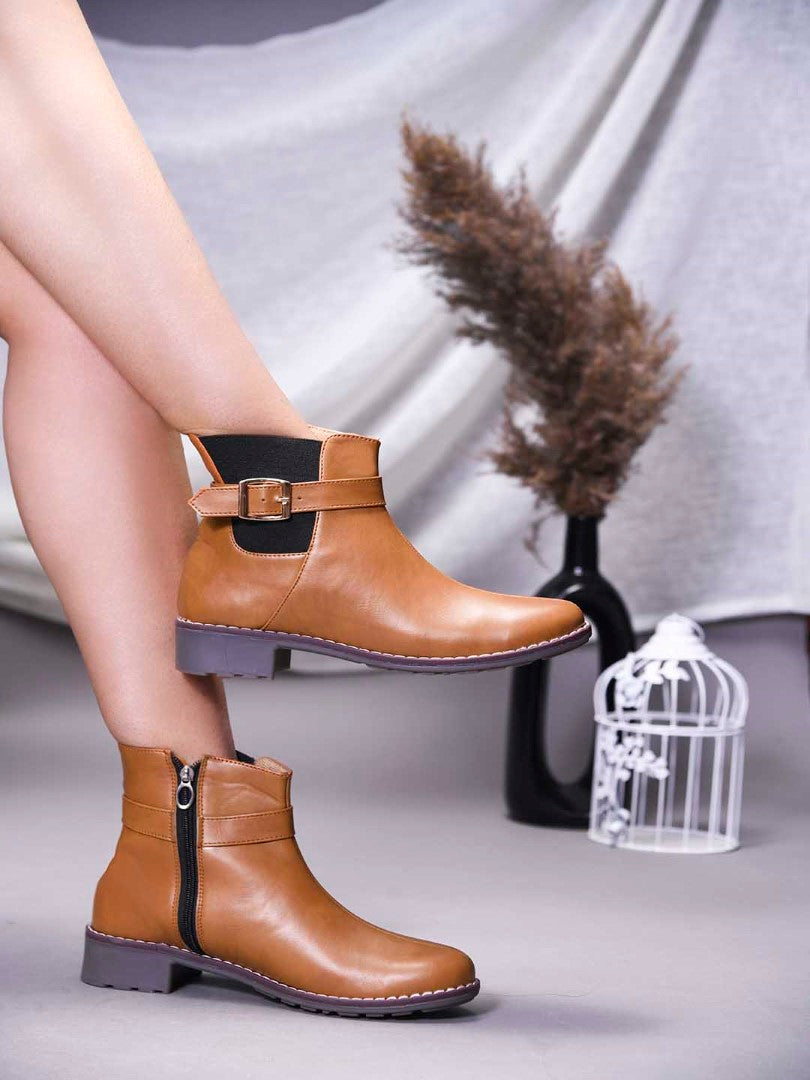 JM Looks women's ankle boots with a decorative buckle strap and a side zipper
Tan