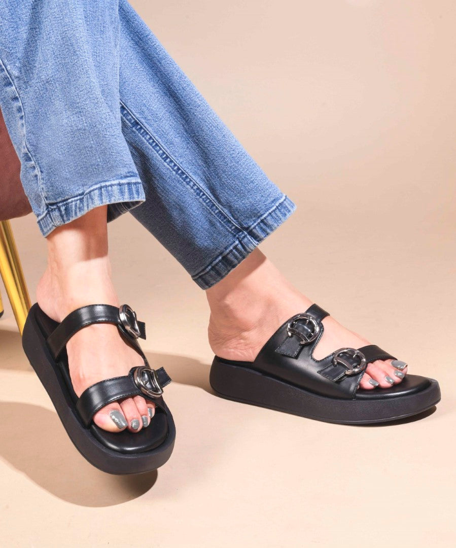 JM Looks platform slides with two adjustable buckle straps and a matching sole
Black