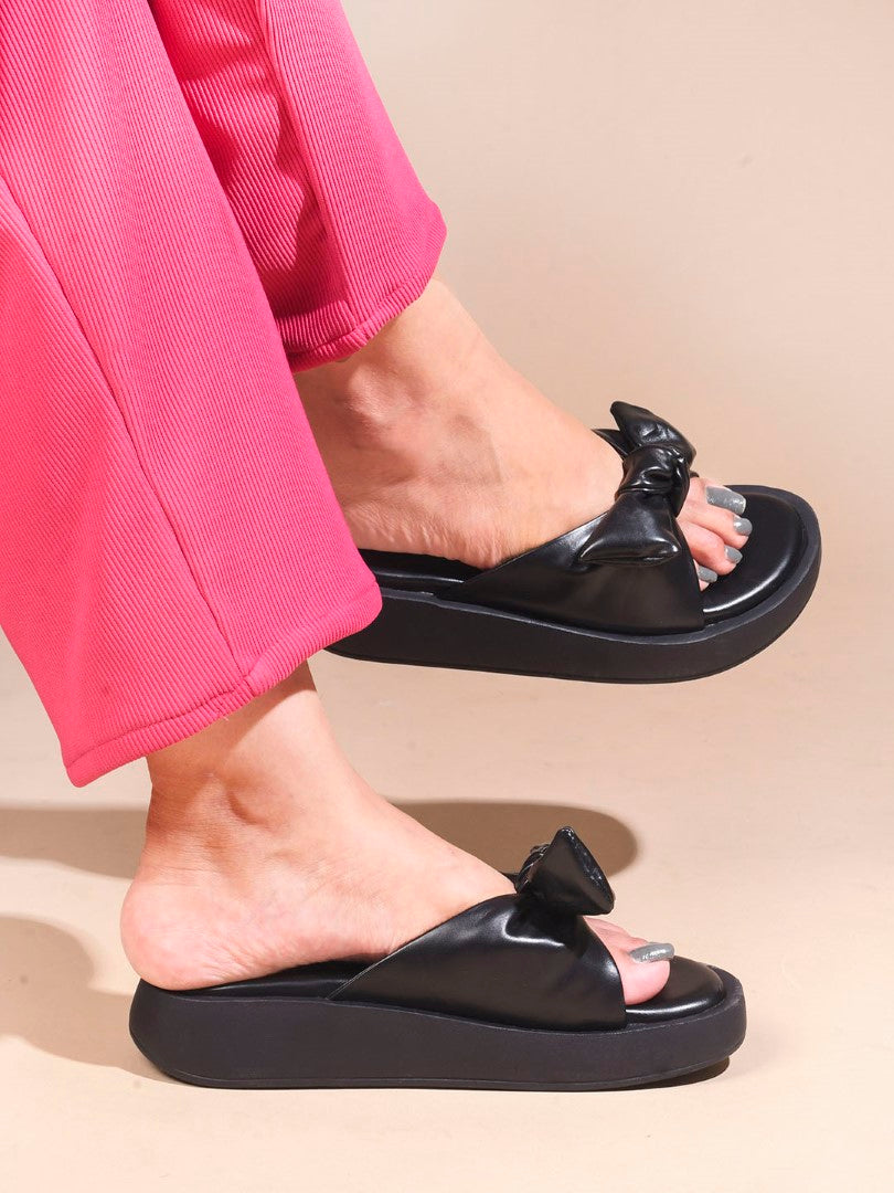JM Looks women's platform slides with a large bow detail on the strap
Black