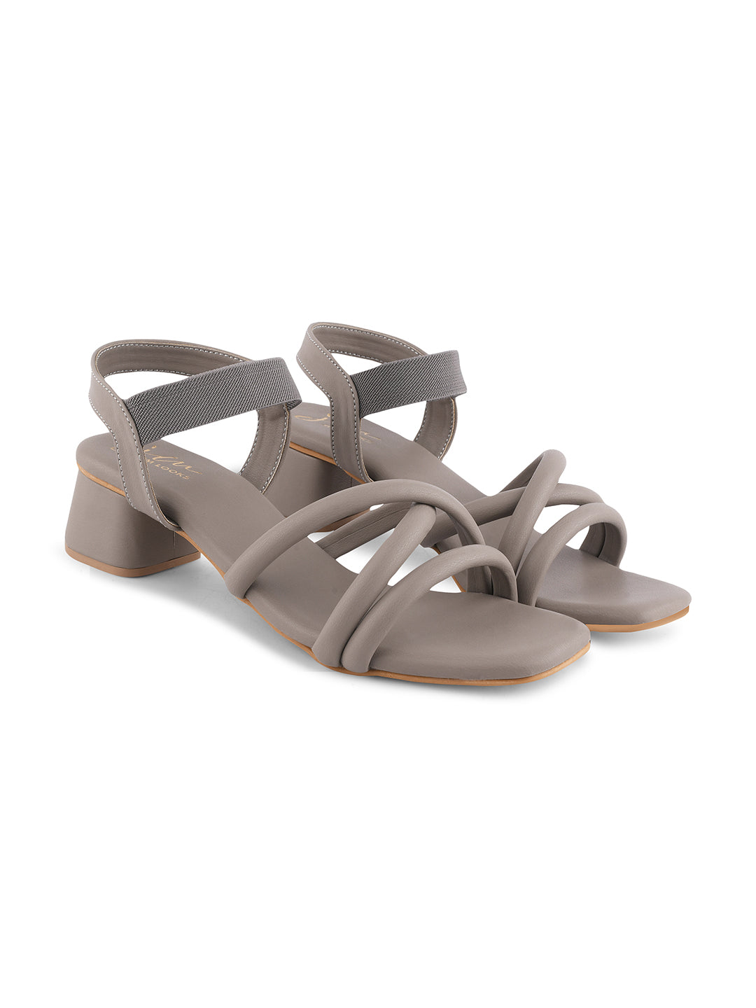block heel sandals featuring padded, intertwined straps and an adjustable ankle strap
Beige