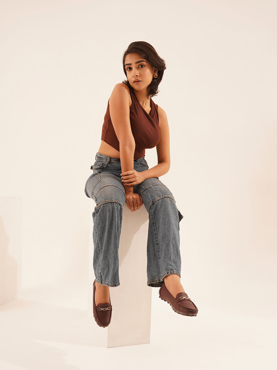 casual loafers with a metal bit embellishment on the vamp and a textured sole
Cherry