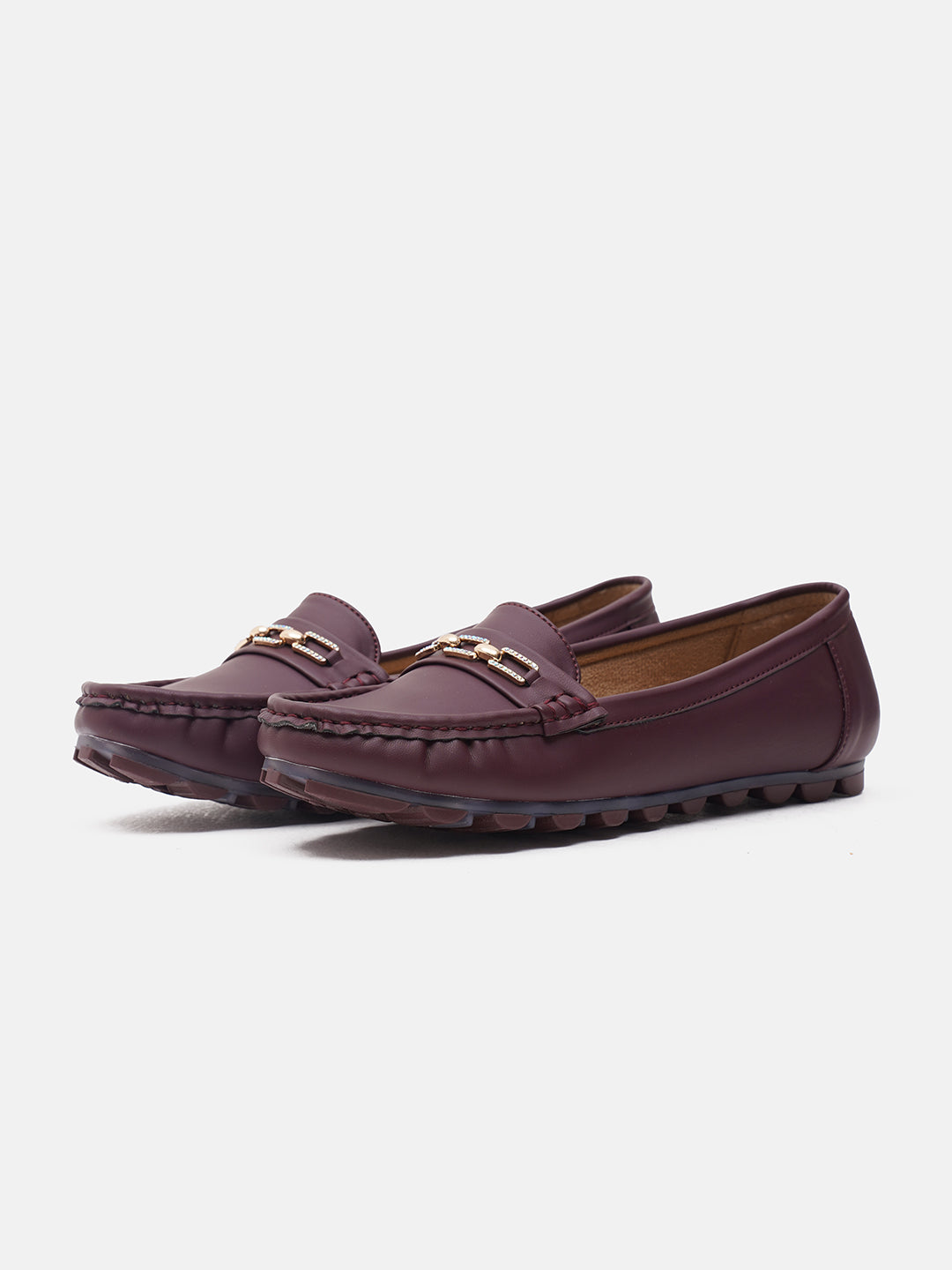 casual loafers with a metal bit embellishment on the vamp and a textured sole
Cherry