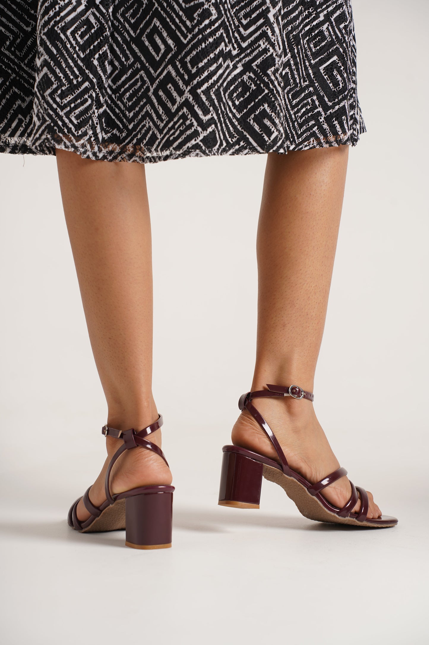 Jm Looks strappy block heel sandals with a patterned dress
Cherry