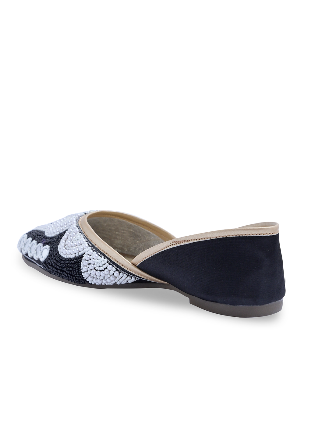 traditional juttis heavily embellished with pearls and beads on the upper
Black