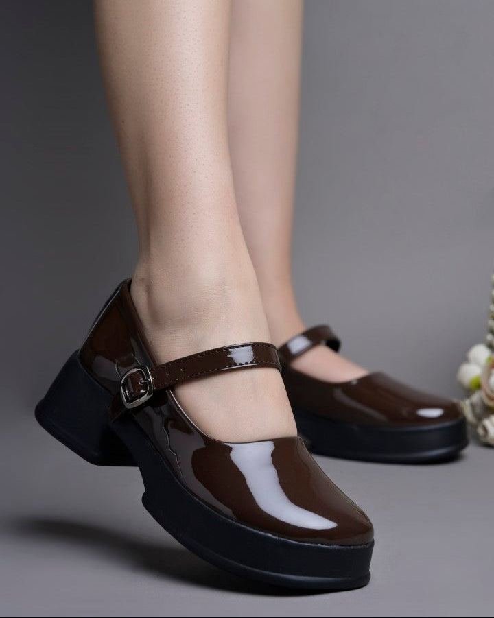Jm Looks patent Mary Jane platform shoes with a buckled strap
Brown