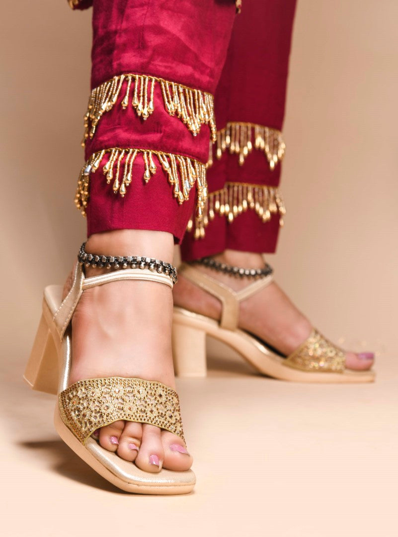 Jm Looks low block heels with an embellished broad front strap and an ankle strap
Golden