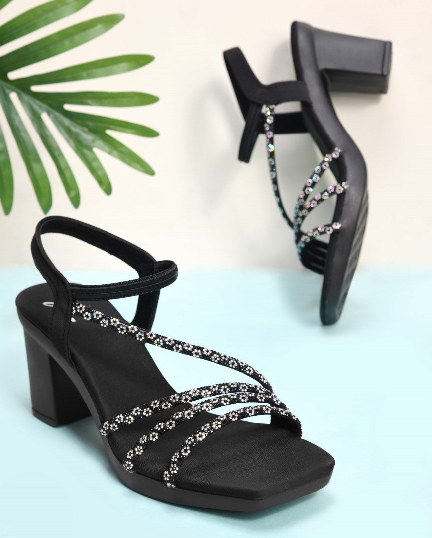 Jm Looks block heels featuring shimmering multi-straps and an elasticated ankle strap
Black