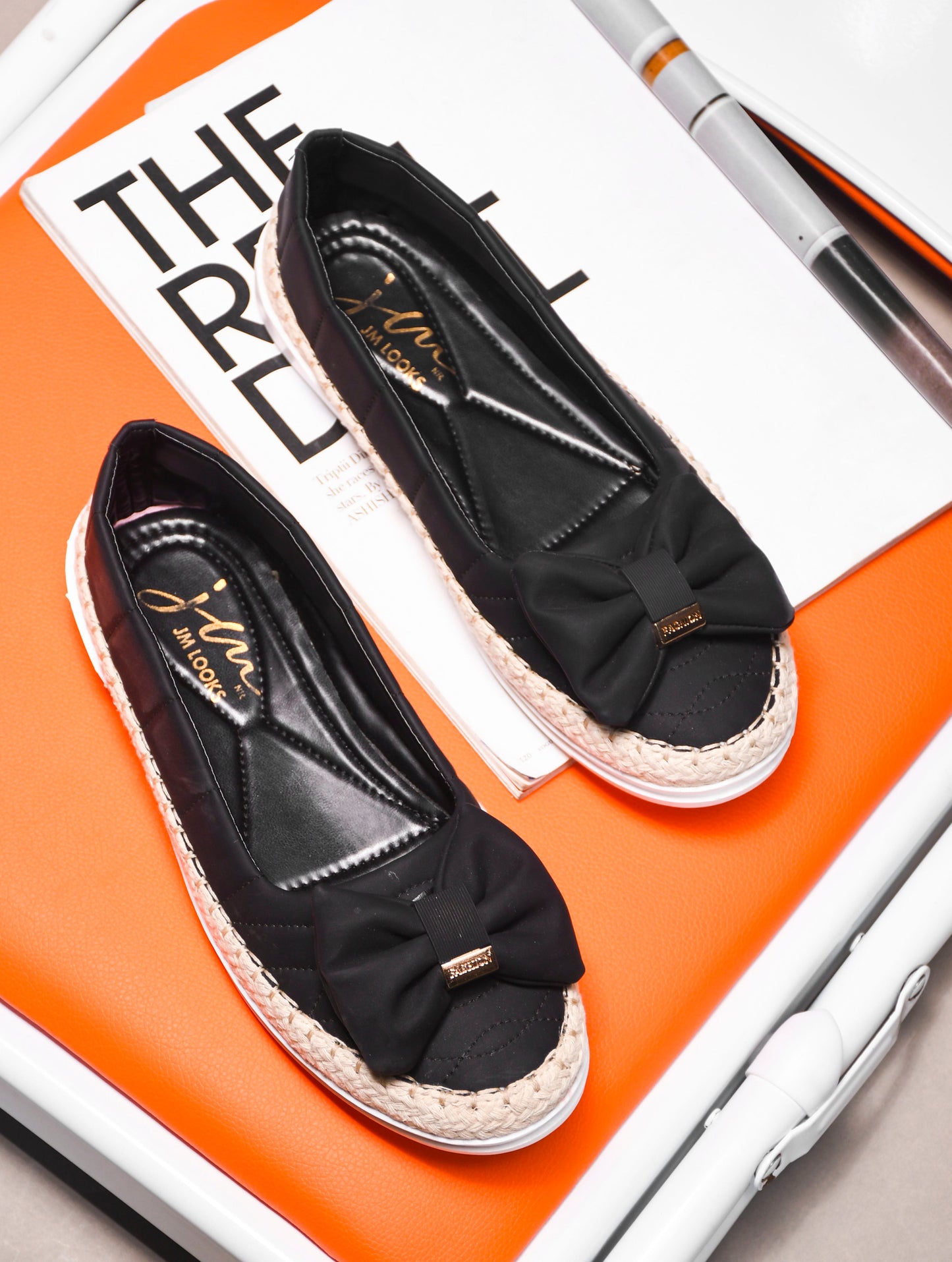 JM Looks espadrille loafers featuring a prominent bow and woven sole detail
Wood Rose
