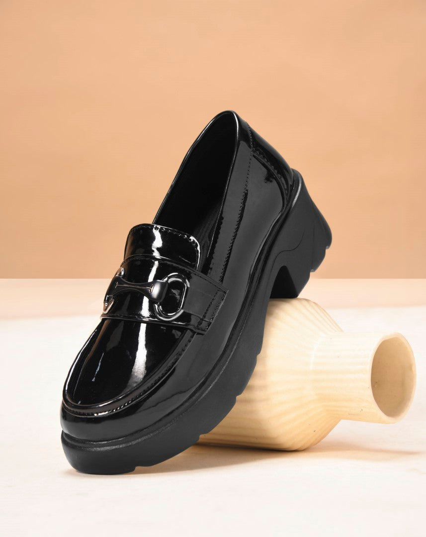 Jm Looks chunky sole loafers with a buckle detail on the vamp
Black