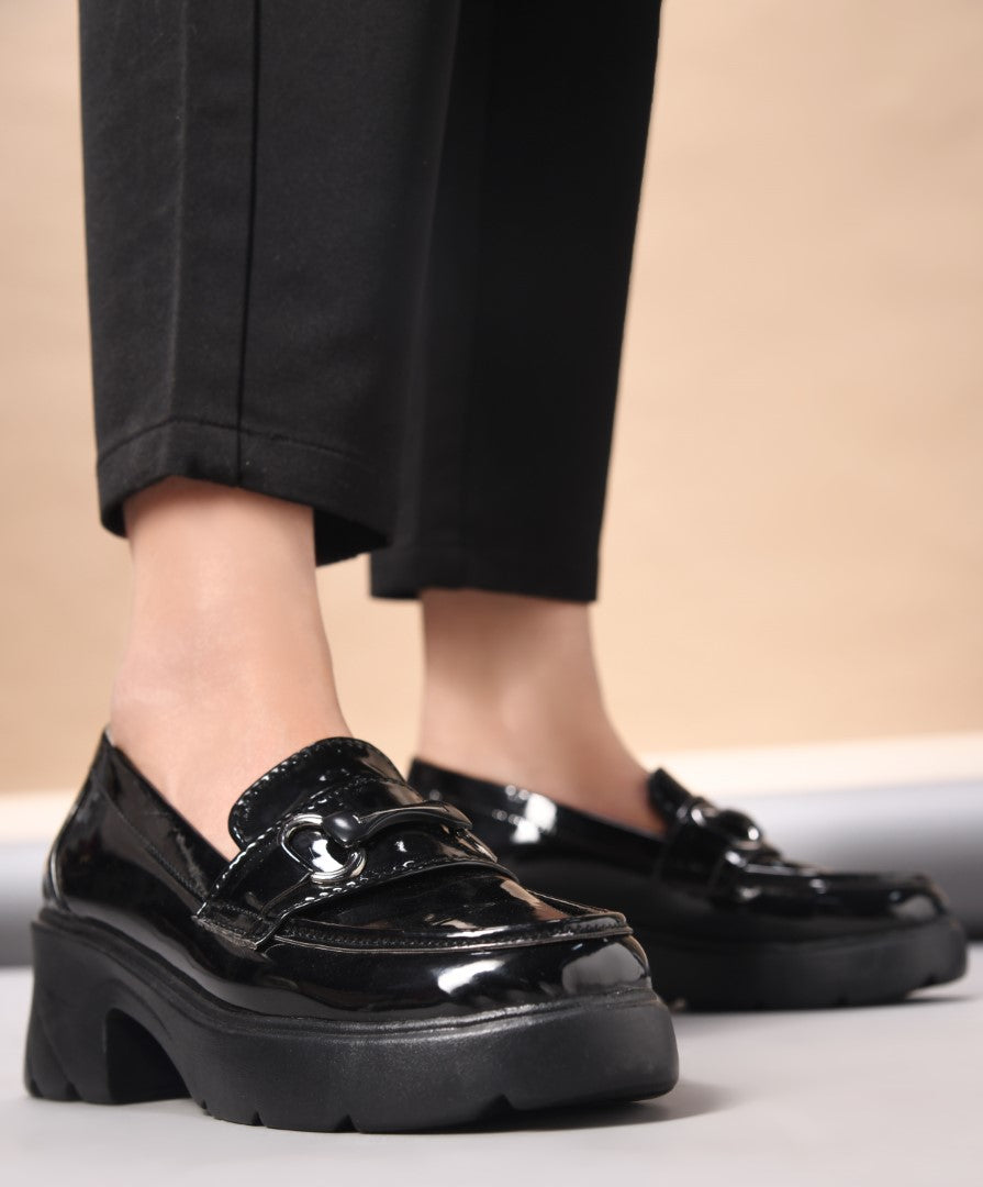 Jm Looks chunky sole loafers with a buckle detail on the vamp
Black