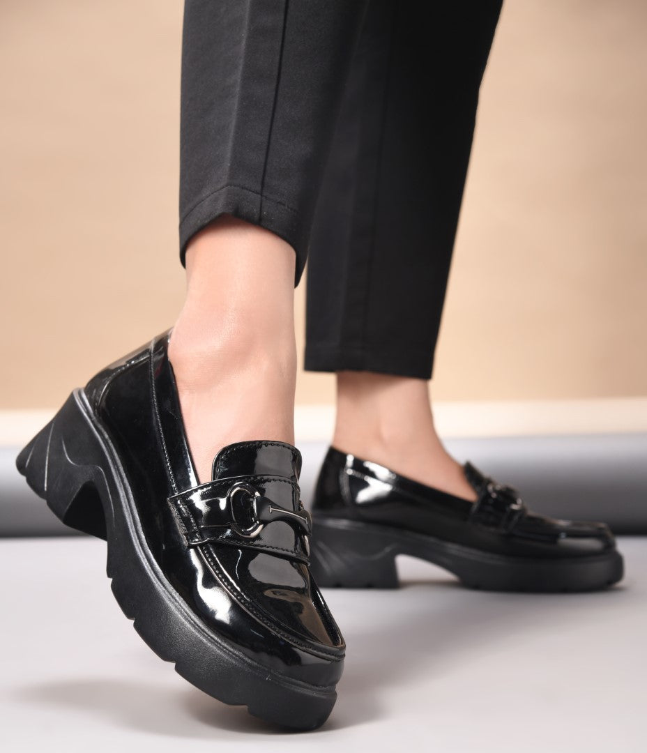 Jm Looks chunky sole loafers with a buckle detail on the vamp
Black