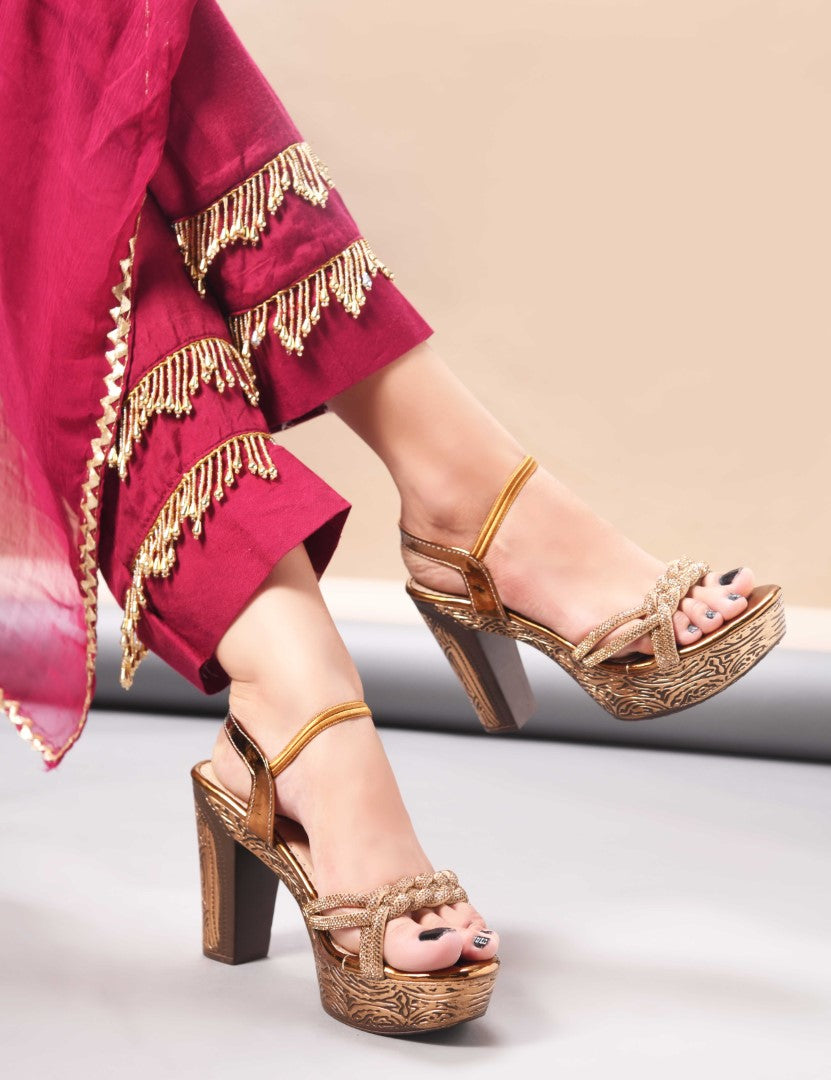 Jm Looks platform heels with braided straps and an ankle strap, paired with traditional attire
Antique