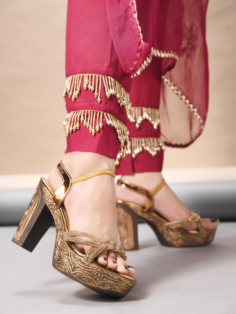 Jm Looks platform heels with braided straps and an ankle strap, paired with traditional attire
Antique