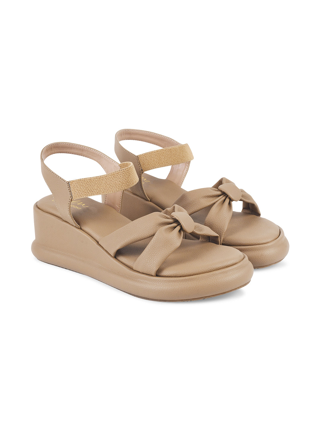 JM Looks platform wedge sandals featuring a prominent tied bow and an elastic ankle strap
Tan