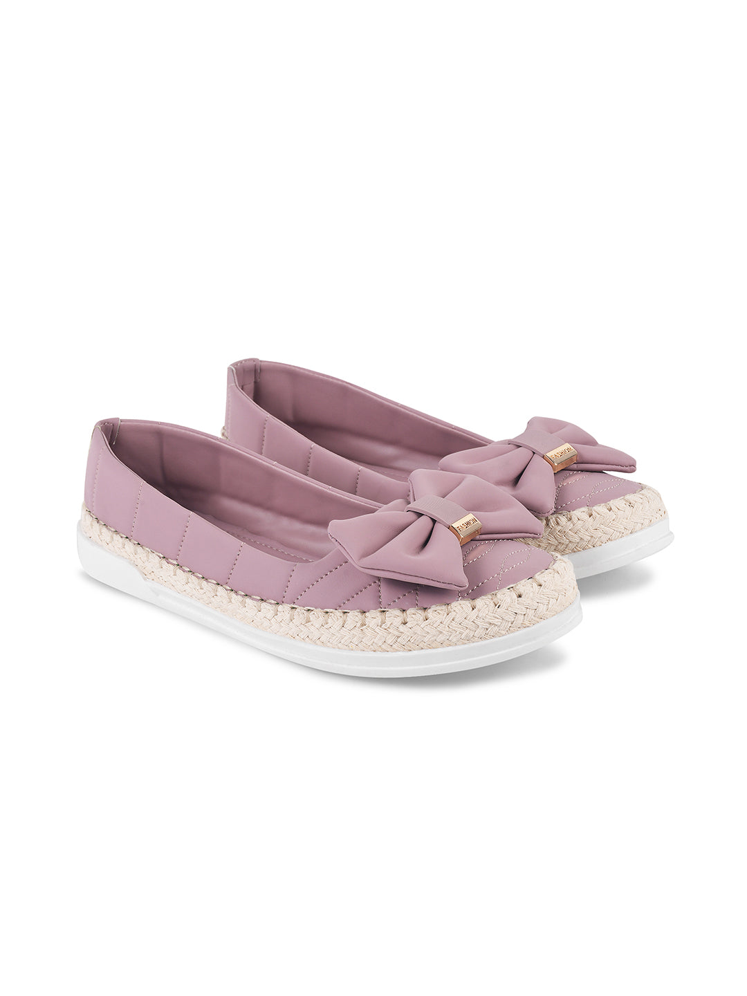 JM Looks espadrille loafers featuring a prominent bow and woven sole detail
Black