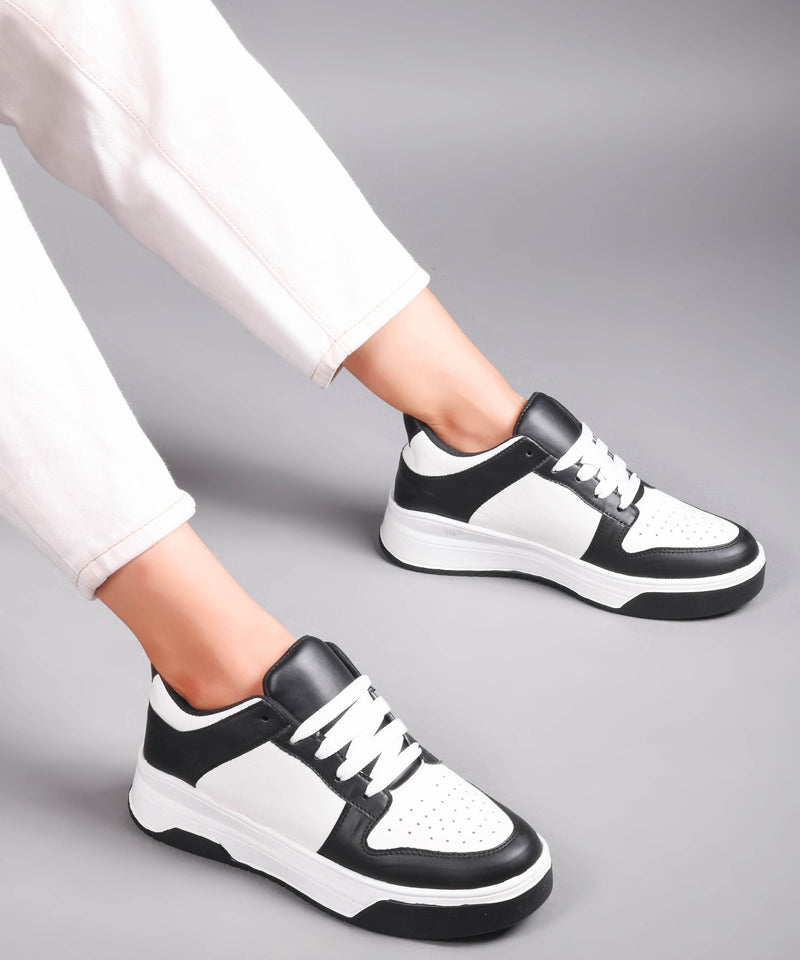 platform lace-up sneakers with a two-tone design and a chunky sole
 Black