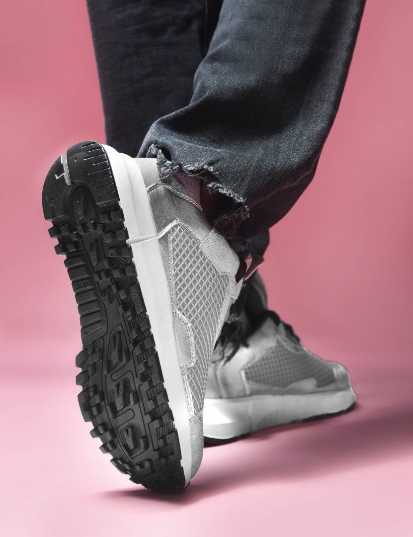 chunky sole sneakers with mesh panels and durable outsoles
Grey