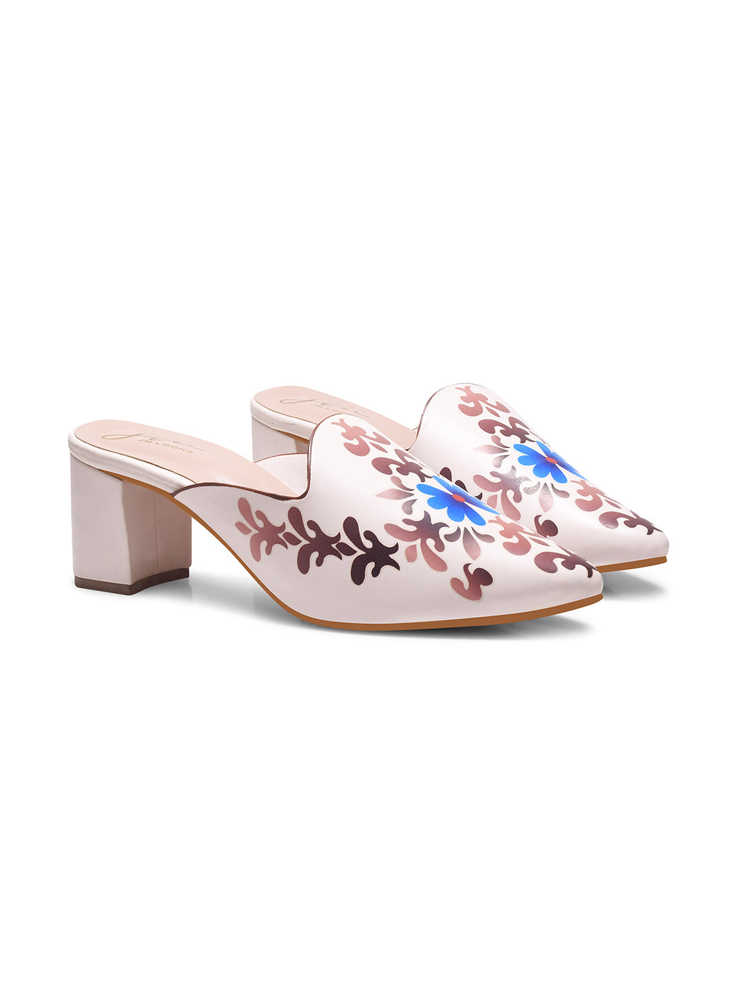 A women's mule shoe featuring a charming floral design and a block heel
Cream