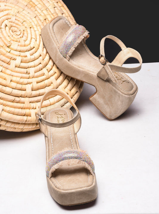 women's platform sandals featuring a main strap embellished with rhinestones and fringe
 Beige