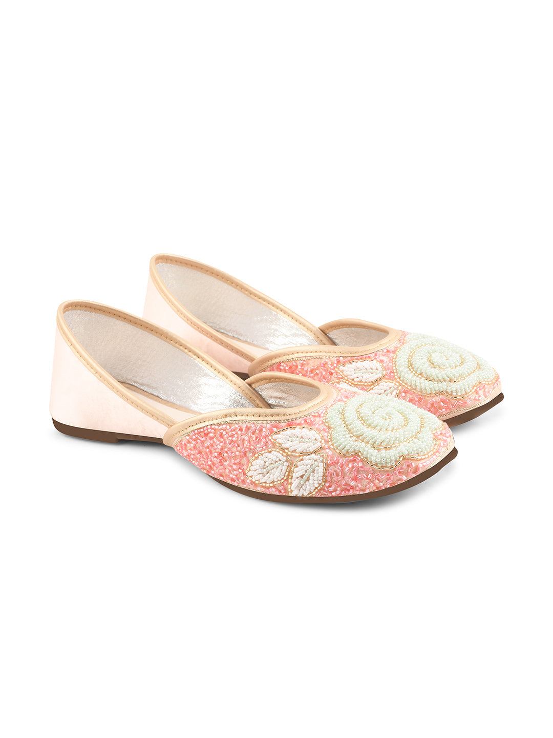 exquisitely beaded juttis featuring a floral design with intricate patterns
Peach