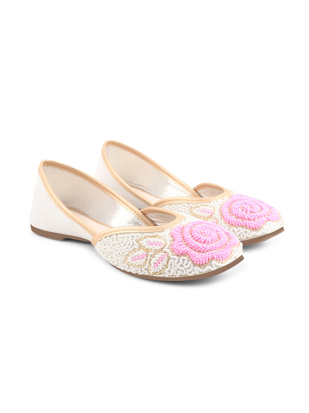 exquisitely beaded juttis featuring a floral design with intricate patterns
White