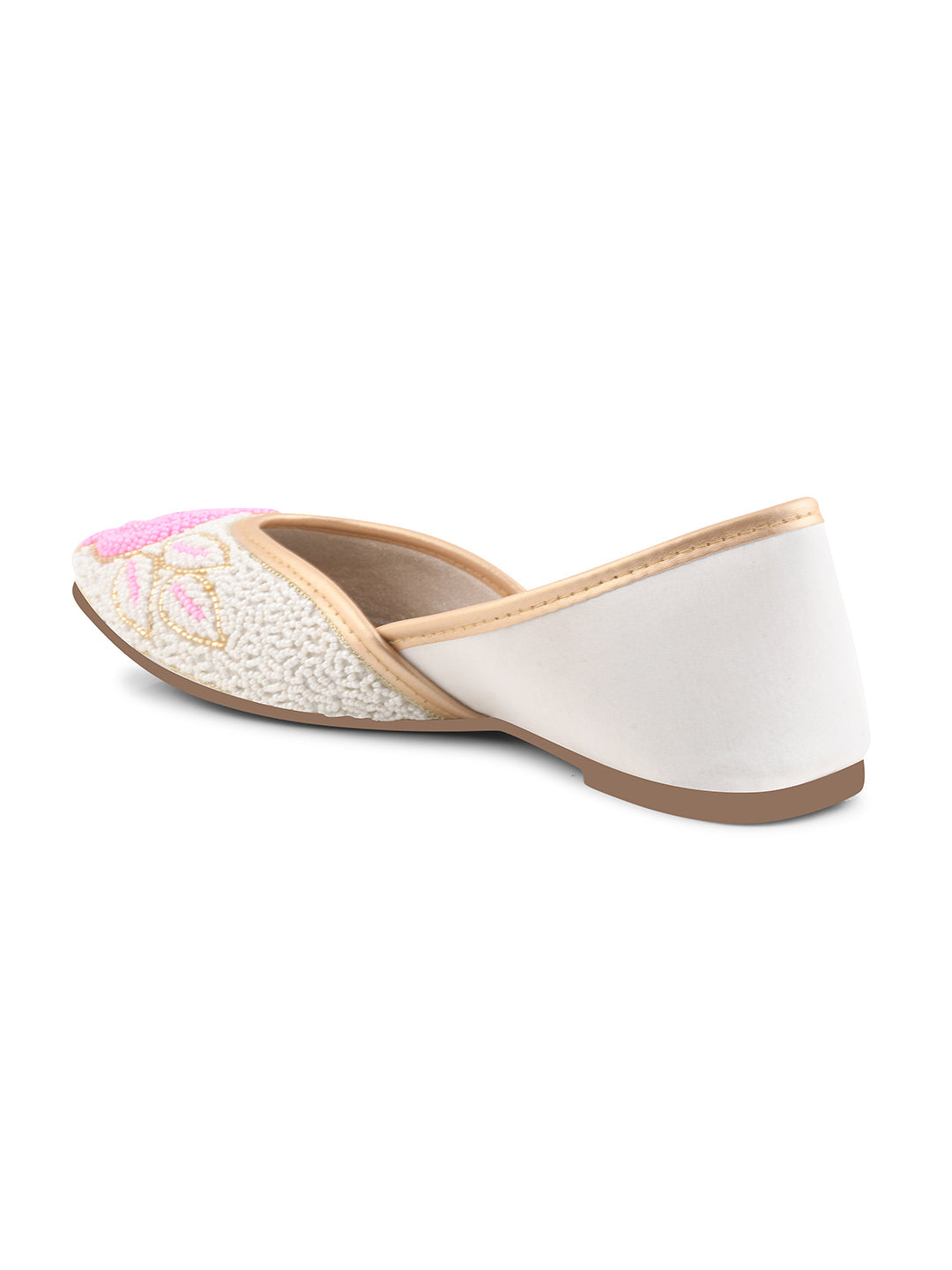 exquisitely beaded juttis featuring a floral design with intricate patterns
White