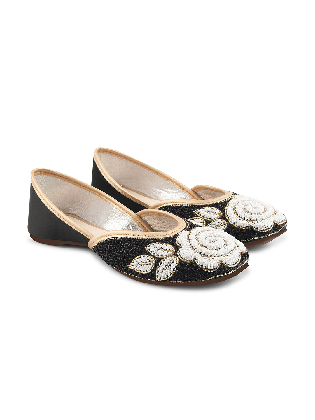 exquisitely beaded juttis featuring a floral design with intricate patterns
Black