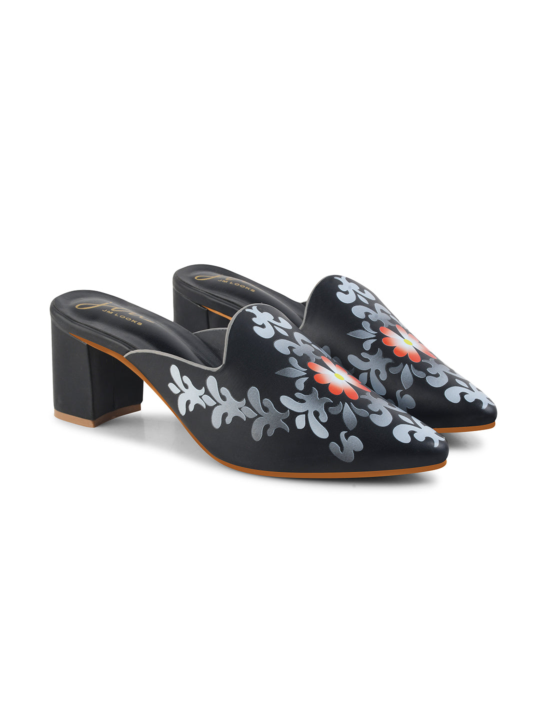 A women's mule shoe featuring a charming floral design and a block heel
Black