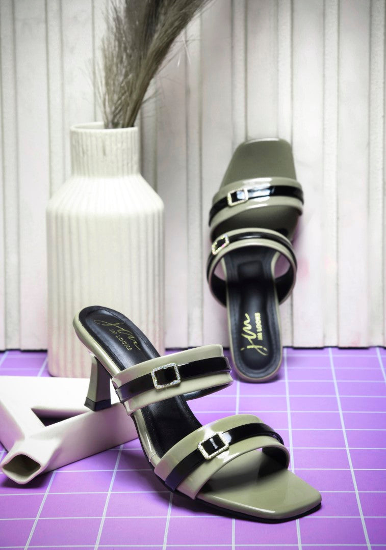 double-strap heel mules with decorative buckles and a square toe
Green