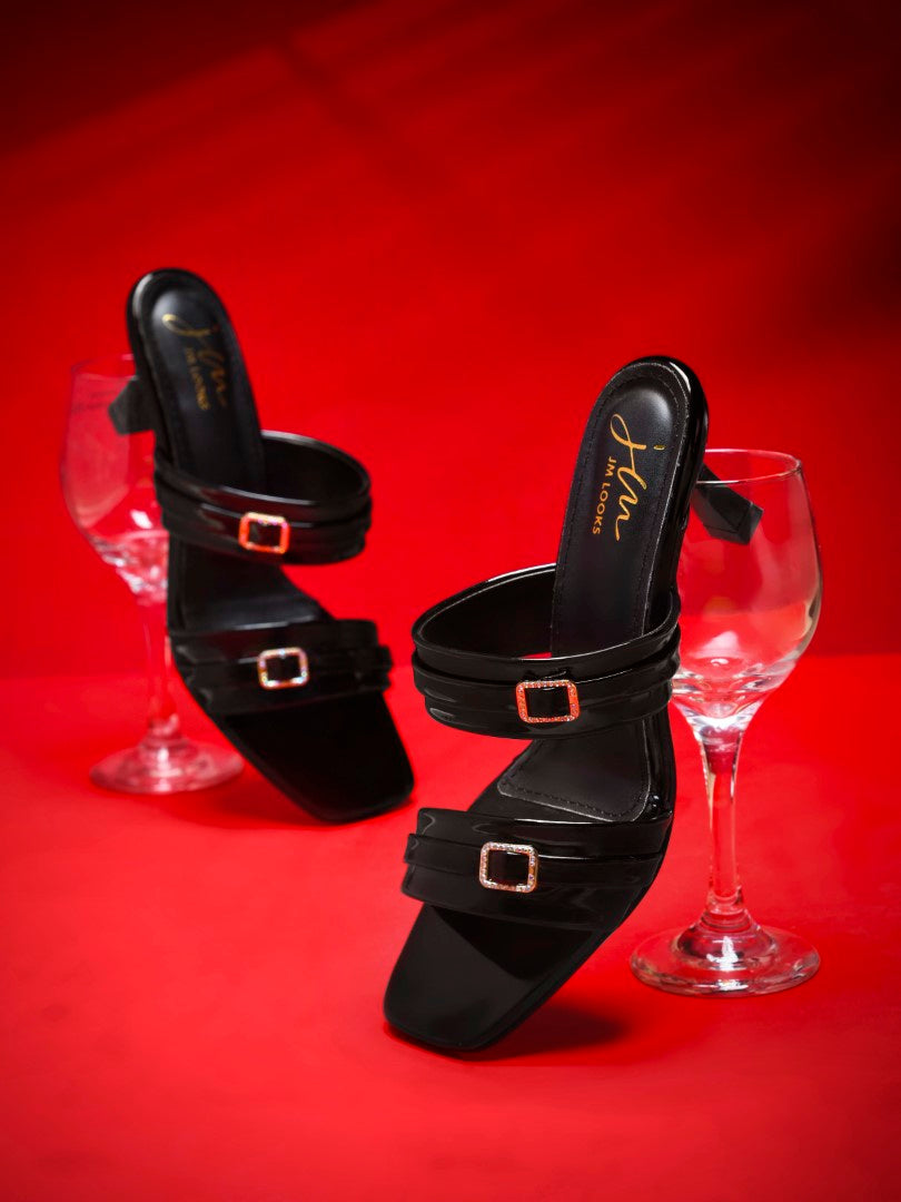 double-strap heel mules with decorative buckles and a square toe
Black