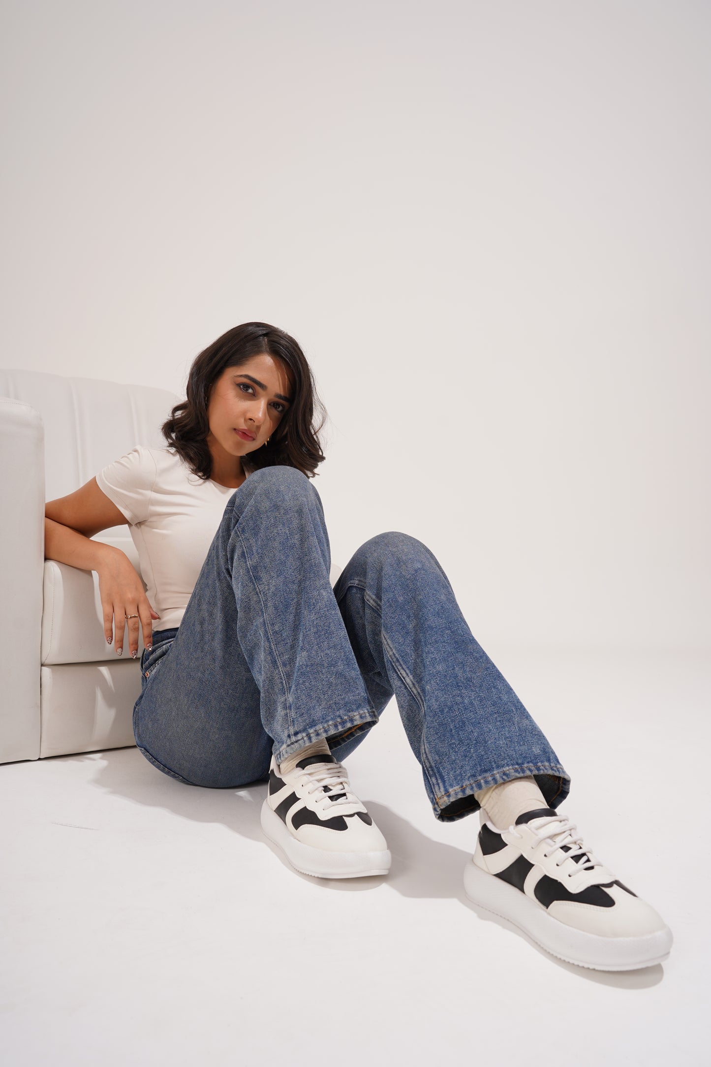 casual lace-up sneakers with distinctive panel detailing on the sides
-Black Black-White
