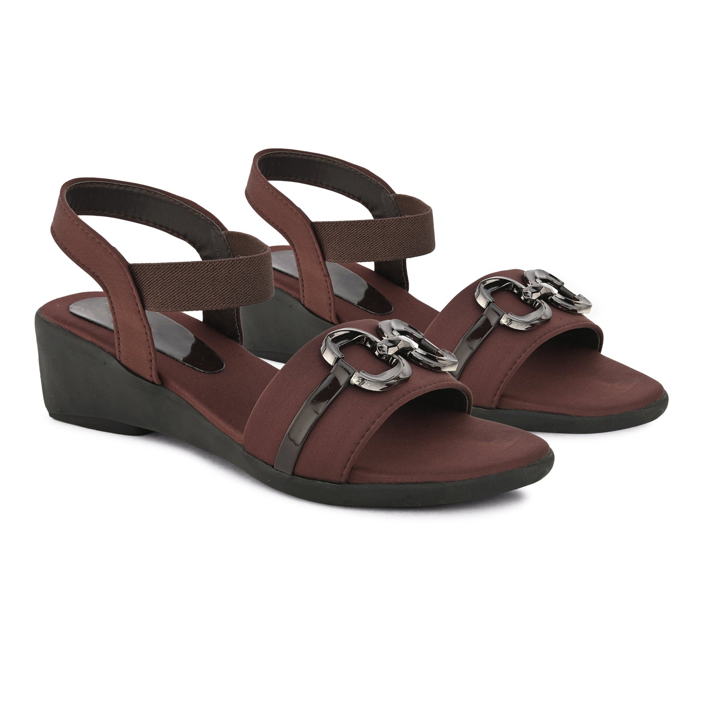 Jm Looks wedge sandals featuring a decorative buckle and an elastic ankle strap
Brown