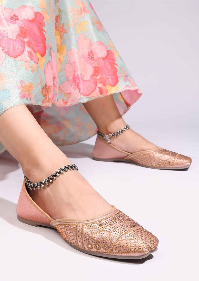 JM Looks women's juttis with intricate embellishments and a traditional design
Beige