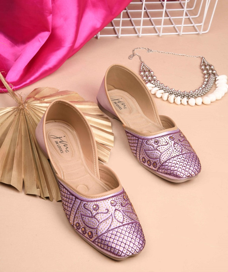 JM Looks women's juttis with intricate embellishments and a traditional design
Purple