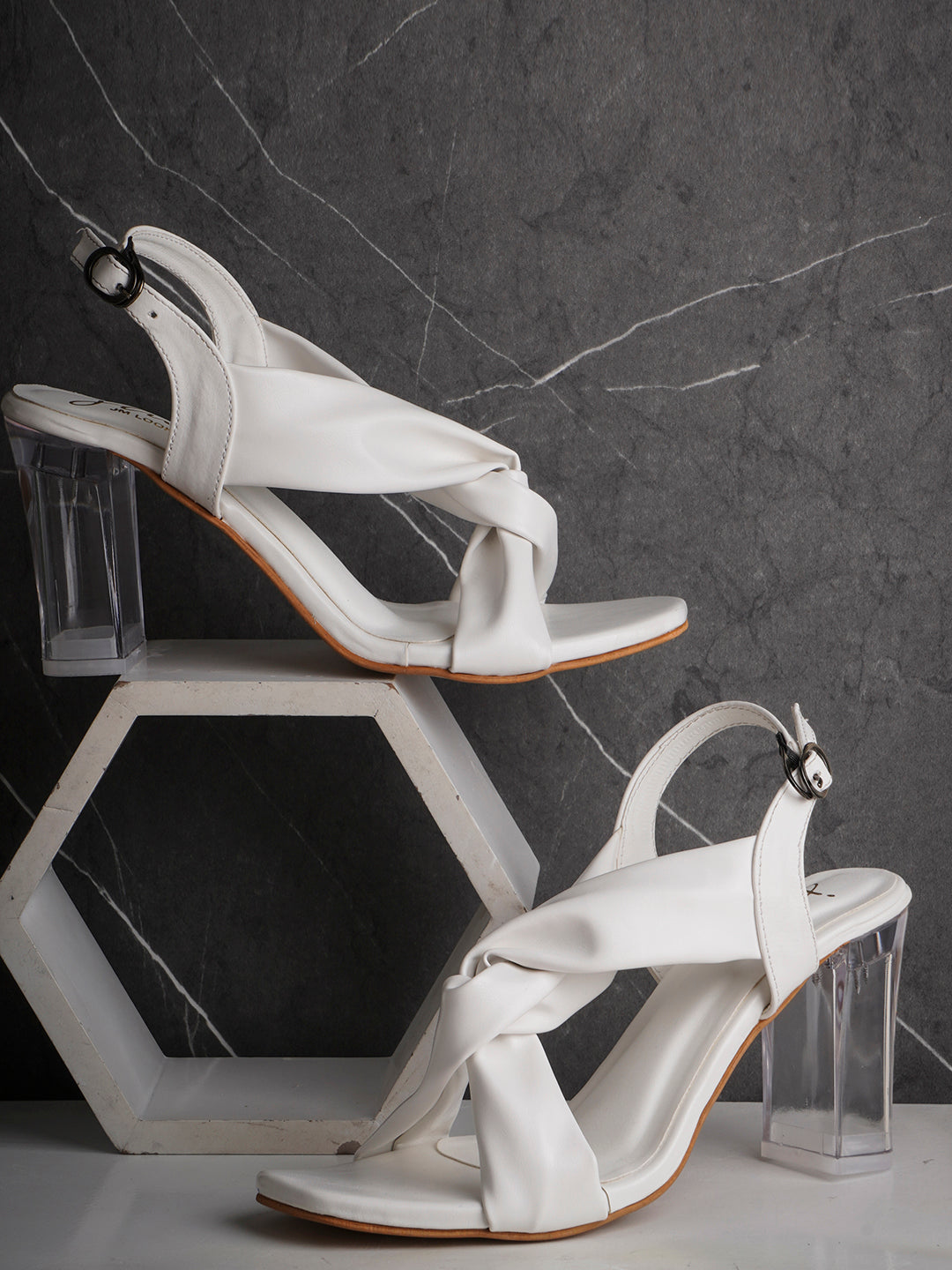 Jm Looks women's twisted strap clear heel sandals with an ankle strap
White