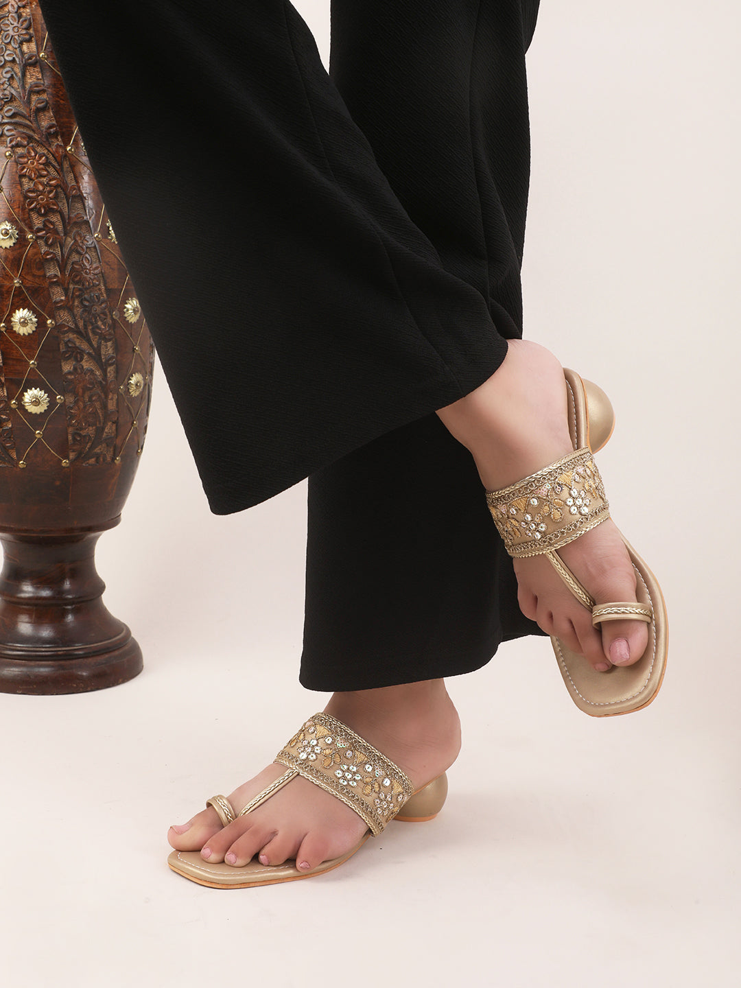 embellished toe-ring sandals with a low block heel
 Golden